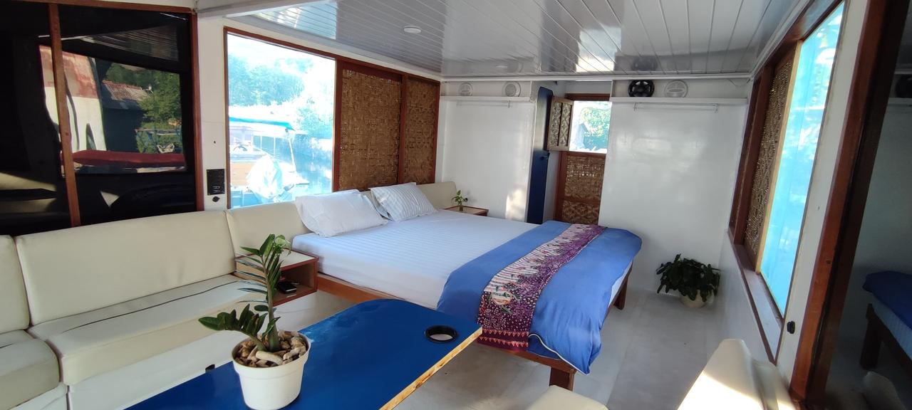 Kamar Jetty Camper Boar 2p di Omah Alchy Cottage & Resort (Pinggir Laut)